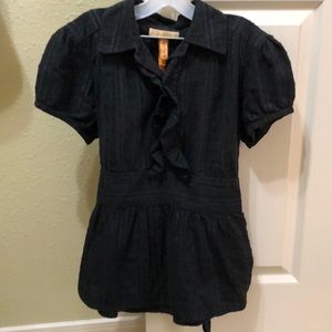 ruffled shirt with subtle silver threads.